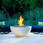 Solus Hemi firepit lit on patio